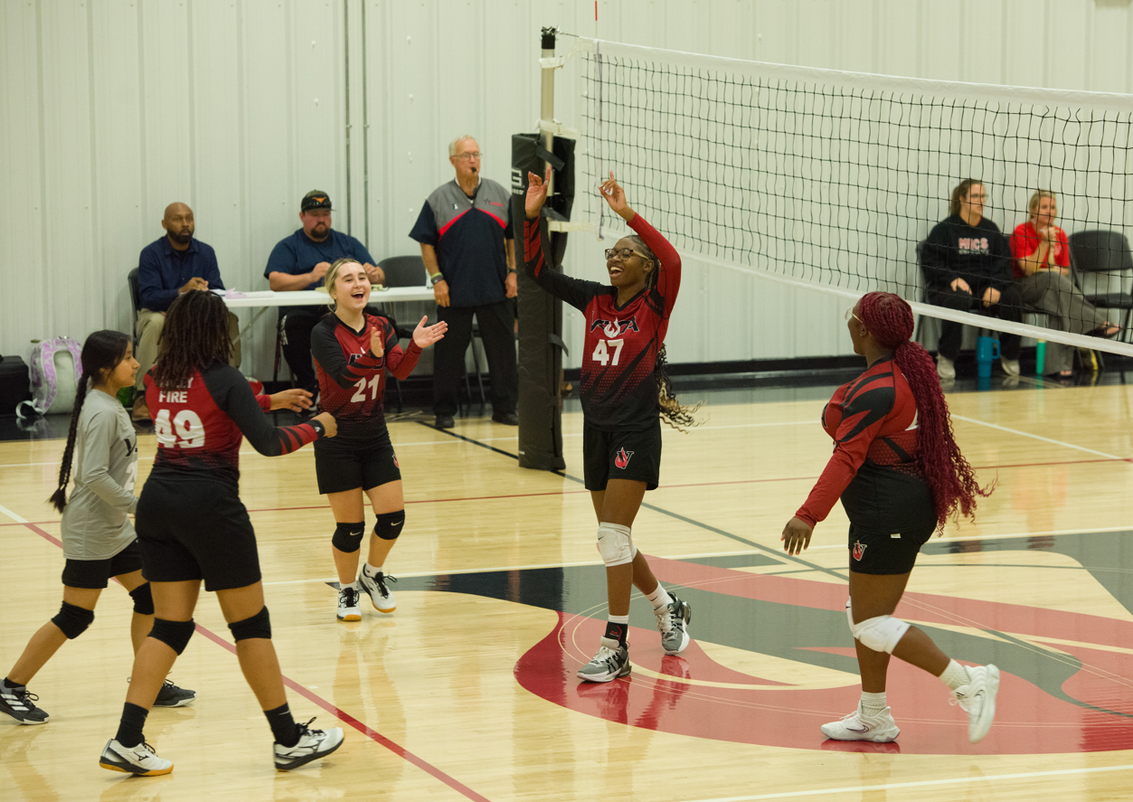 VFCA volleyball team posing for a picture